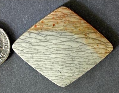 ROYAL SAVANNAH JASPER CABOCHON (MADAGASCAR) – 26.30 CT.